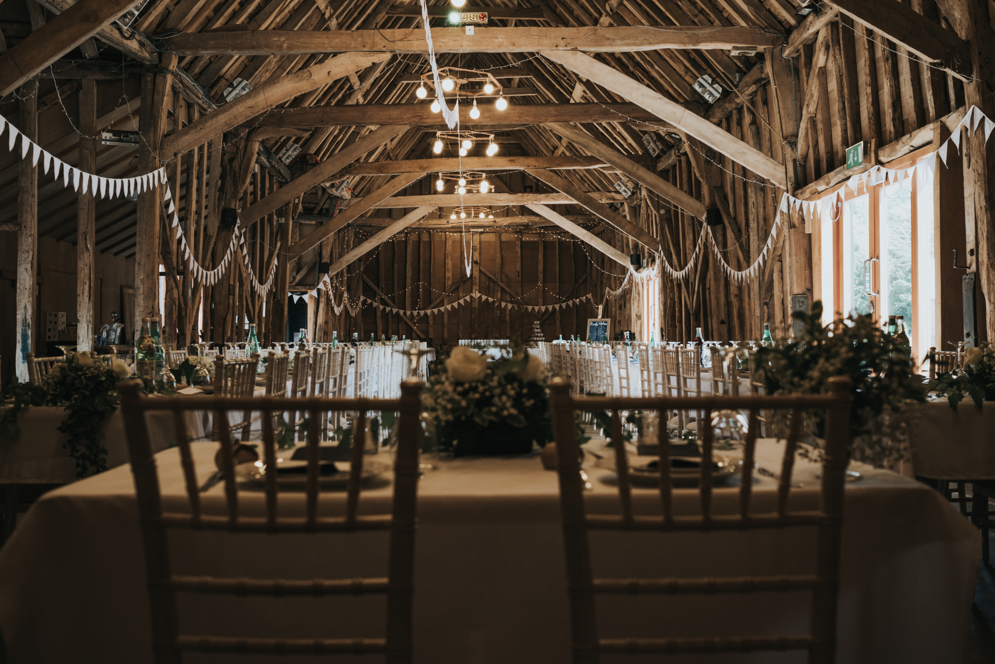 Wedding reception set up at The Tythe Barn, Rustic Wedding Venue