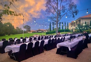 Founders Terrace – Long tables w festoon lighting 1