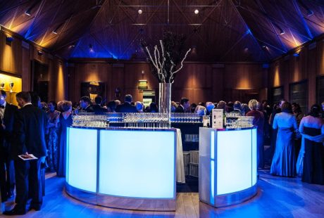 Livery Hall circular bar with lighting and people in Haberdasher's Hall Londo