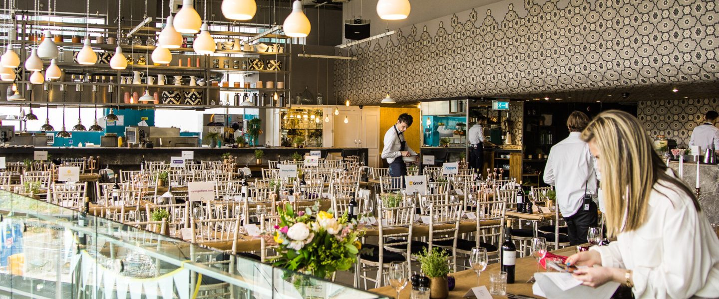 Dining Area With Tables And Chairs At The Drift London Wedding