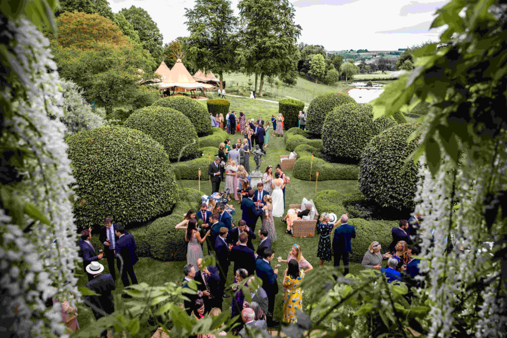 Reception Terrace & Tipis in field At Cornwell Manor Oxfordshire Wedding