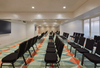 HRBRIS_HibiscusRoom_Theatre_DoorsClosed_LowRes