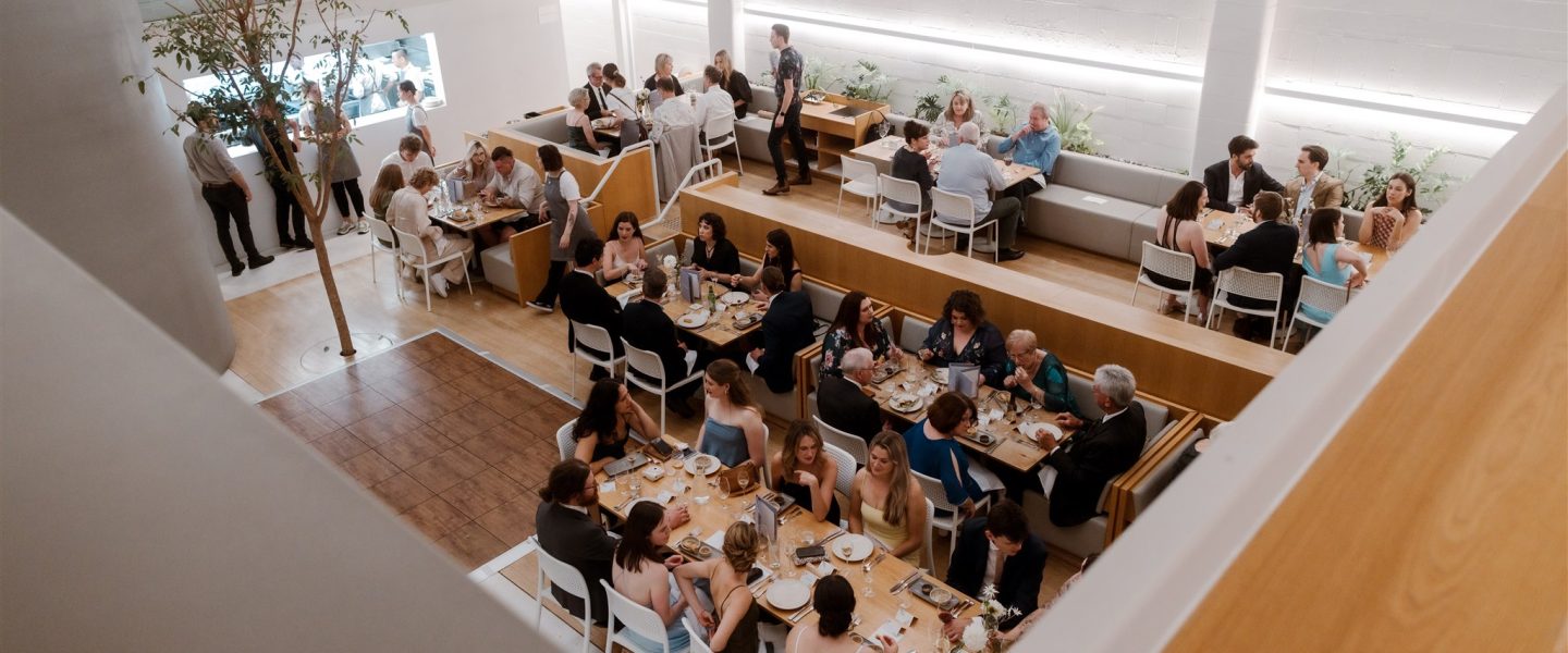 Dining Guests At Industry Beans
