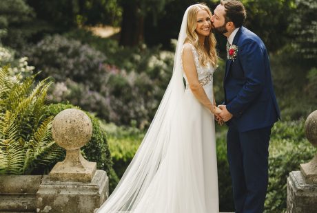 Groom Kissing Bride At Larmer Tree